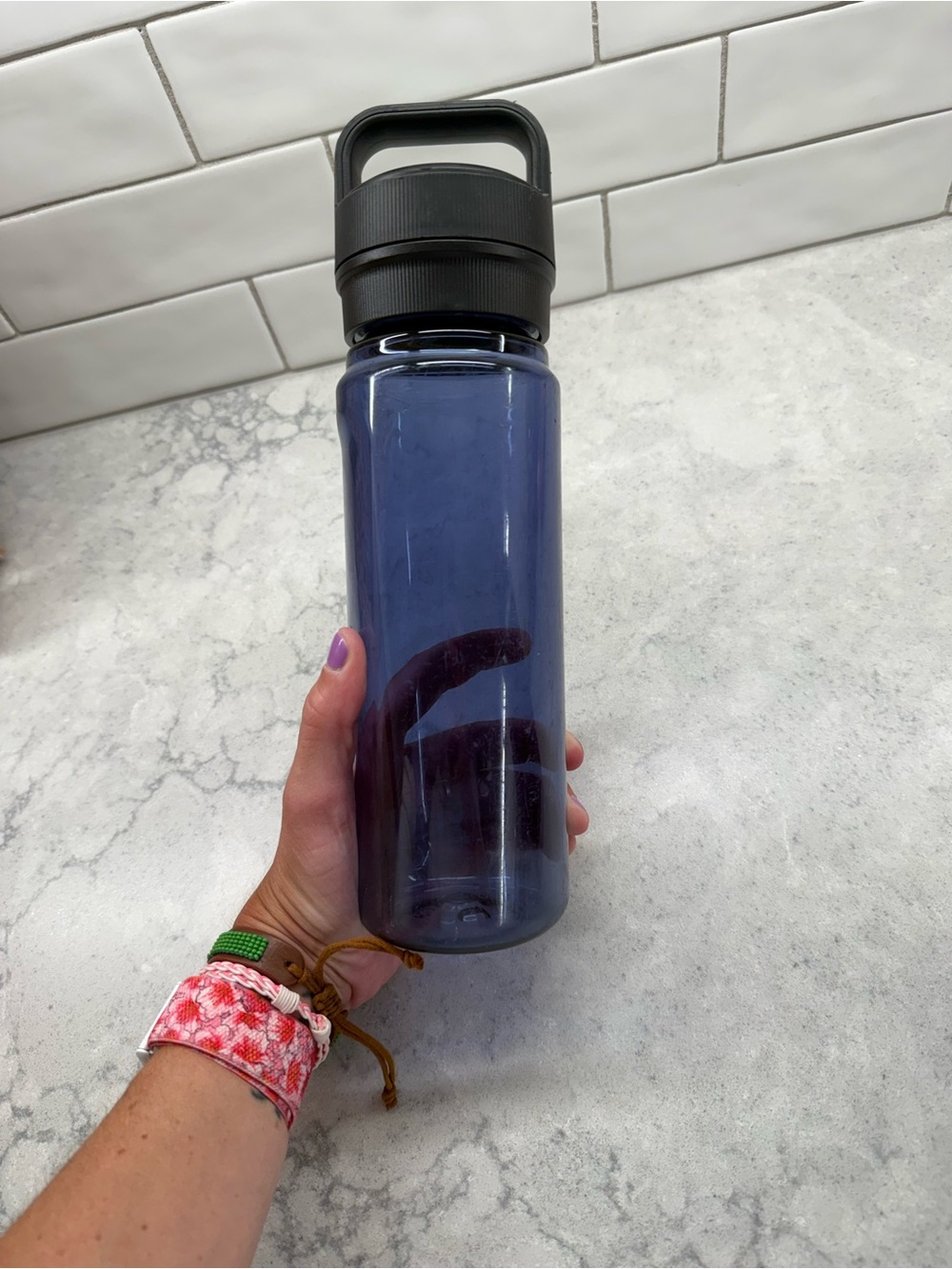 Yeti Blue Water Bottle with Black Carry Lid